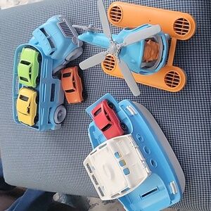 Three Green Toys: Car Carrier, Ferry, and Helicopter